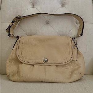 Ivory cream leather Coach hobo style shoulder bag with pink lining, barely used.